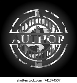 Author on grey camouflage texture