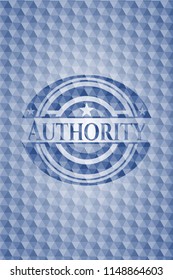 Authority blue badge with geometric pattern background.