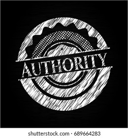 Authority chalk emblem written on a blackboard