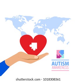 Autism awareness concept with human hand. heard world