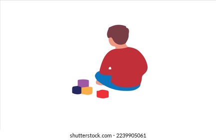 Autism. Boy feeling lonely. Child Playing Alone With Cubes Toys.