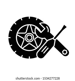 Auto parts glyph icon. Wheel and instruments. Repair service maintenance concept. E commerce department, online shopping categories. Silhouette symbol. Negative space. Vector isolated illustration