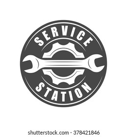 Auto service logotype, wrench and gear silhouette
