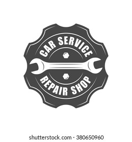 Auto service logotype, wrench and gear silhouette