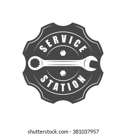 Auto service logotype, wrench and gear silhouette