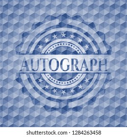 Autograph blue badge with geometric pattern.