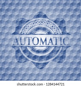 Automatic blue emblem or badge with abstract geometric pattern background.