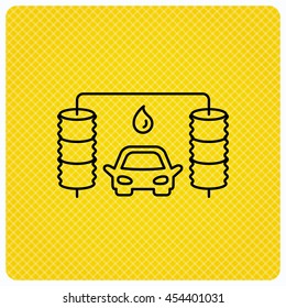Automatic car wash icon. Cleaning station with water drop sign. Linear icon on orange background. Vector