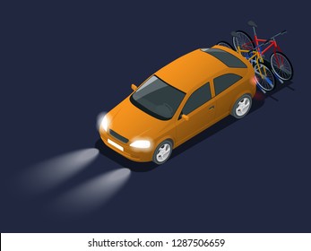 Automobile car headlights in darkness. Isometric bikes loaded on the back of a ban. Car and Bicycles.