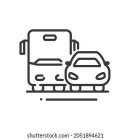 Automobile transport- vector line design single isolated icon on white background. High quality black pictogram. Truck and car are standing side by side. Waiting for a green light. City traffic.