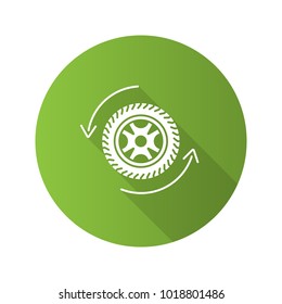 Automobile wheel changing flat design long shadow glyph icon. Car rim and tire with circle arrow. Vector silhouette illustration