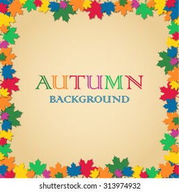Autumn abstract background with colorful leaves framing negative space for text