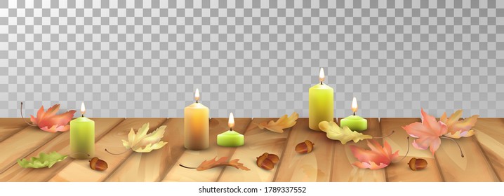 Autumn abstract background. Lit candles and fallen leaves on the wooden floor