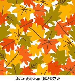 Autumn backdrop with bright falling leaves on white background. Green, yellow, orange. Isolated vector seamless pattern. Simple cartoon flat style for textile, wrapping paper, wallpaper.