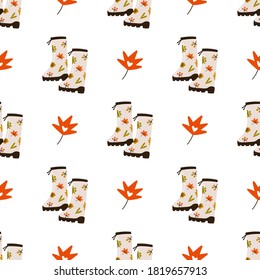 Autumn backdrop with cute rubber boots and orange maple leaves on white background. Isolated vector seamless pattern. Autumn vibes. Simple cartoon flat style for textile, wrapping paper, wallpaper.