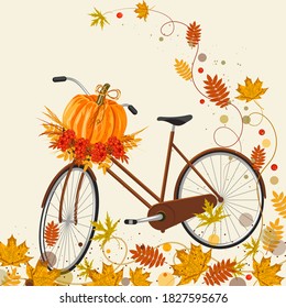 Autumn background with bicycle, pumpkin and colorful leaves.