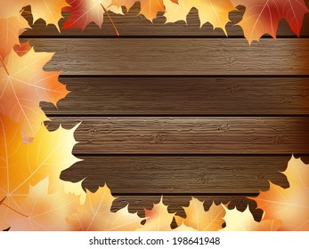 Autumn background with colored leaves on wooden board. plus EPS10 vector file