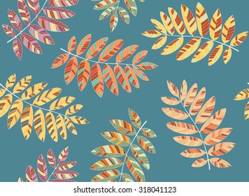 Autumn background. Doodling seamless pattern. Rowan tree leaves.