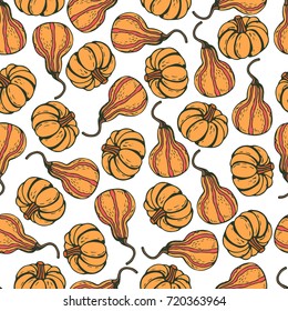 Autumn background. Hand drawn seamless pattern with pumpkins. Halloween background. Vector design elements for greeting cards and prints. 