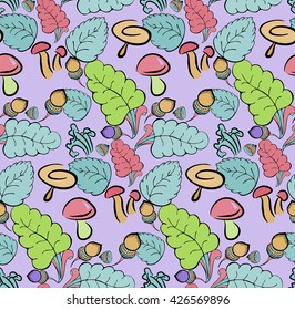 Autumn background with the leaves of birch, oak, acorns and mushrooms. 