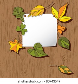 Autumn background with leaves. Empty blank on the wooden background with the space for your text. Thanksgiving card