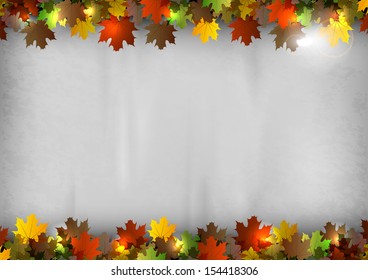 autumn background - leaves on the gray texture