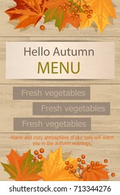 Autumn background with leaves, Rowan text and frames on wooden background.