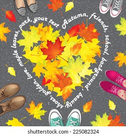 autumn background with maple leaves and feet in boots