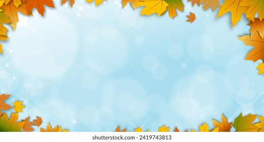 Autumn background with Maples leaves frame border and blurry bokeh light effect on sky blue background,Fall season backdrop with colourful  foliage and sunlight reflection,Banner for Thanksgiving

