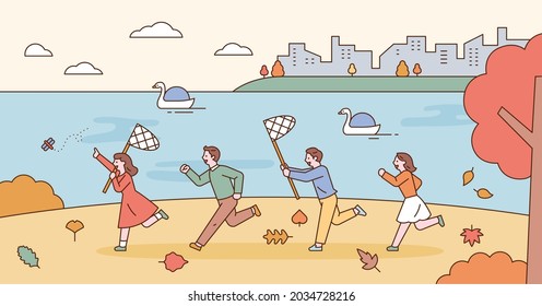 Autumn background people. Out of the city, people are running happily, and red fallen leaves are falling. outline simple vector illustration.