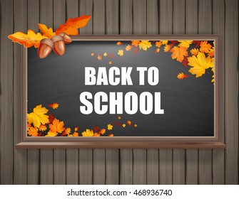 Autumn background with realistic autumn maple leaves on blackboard. Vector back to school chalkboard banner


