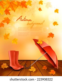 Autumn background with umbrella and rain boots. Vector. 