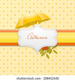 Autumn background with umbrella and rowen