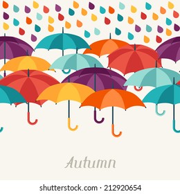 Autumn background with umbrellas in flat design style.