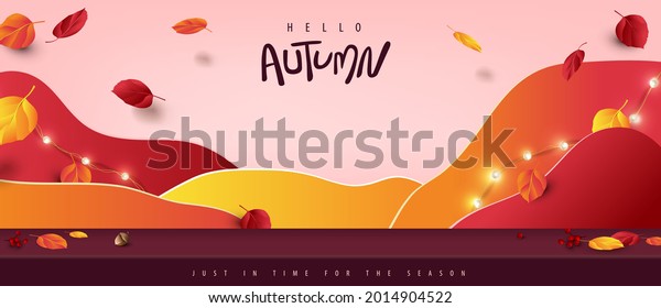 Autumn banner\
background with studio table room product display decorate Variety\
of autumn leaves falling\
