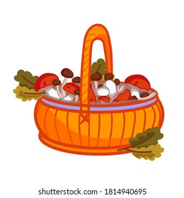Autumn basket with mushrooms and oak leaves