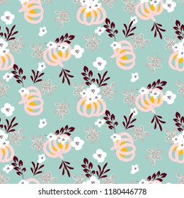 Autumn beautiful chic seamless vector pattern with pumpkins and flowers on blue background. Feminine style.