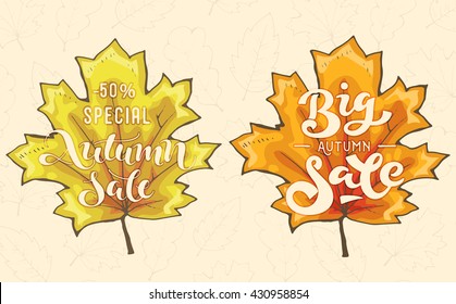 Autumn big sale - handwritten lettering on shape of fall maple leaves; vector illustration; poster or label for promotion in shop or market