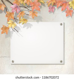Autumn branch with maple leaves on decorative plaster wall. Vector fall background