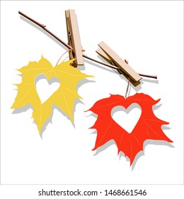 
Autumn bright leaves hang on clothespins. Warm autumn decor