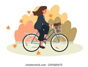 Autumn. Businesswoman on bicycle with basket. Woman in formal clothes cycling to work in the fall park.