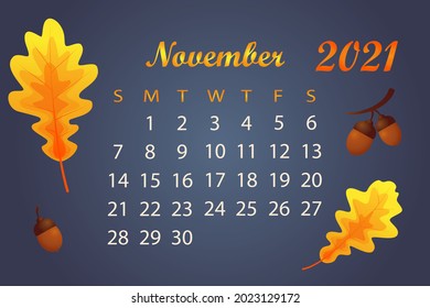 Autumn calendar 2021 year. Calendar template for November 2021. Bright autumn leaves on dark background. Botanical pattern. Oak leaves, acorns. Artistic vector illustration