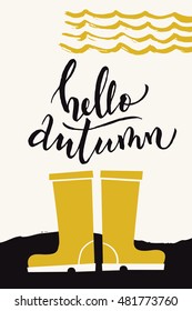 Autumn calligraphy card with rain boots. Hello autumn calligraphic text. Vector abstract design. Colored poster or card designed for  any kind of print media. Gold color. 
