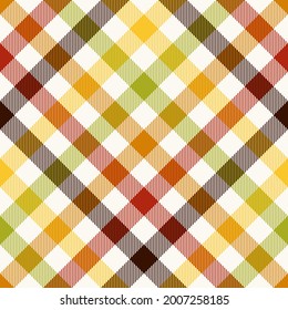 Autumn check pattern. Multicolored gingham vichy tartan in brown, red, orange, green, yellow, off white for tablecloth, picnic blanket, duvet cover, skirt, other modern fashion textile print.