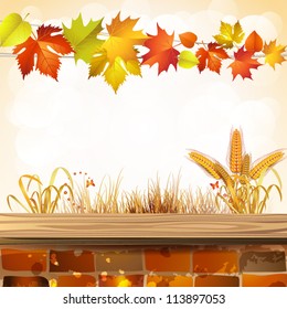 Autumn colorful leaves with brick wall