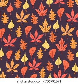 Autumn colorful leaves seamless pattern on dark purple background.