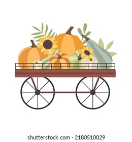 Autumn concept for Harvest festival or Thanksgiving Day. Cart with pumkins, sunflowers and leaves. Background for posters, web, banners, flyers, postcards 