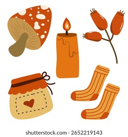 Autumn cozy elements set with mushroom, candle, berries and warm socks.