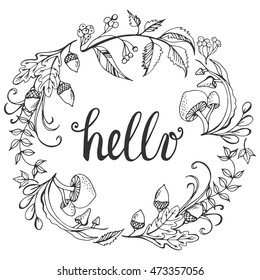 Autumn design for greeting card. Vintage typography elements with beautiful forest ornament. Hand drawn doodle frame made of leaves, mushrooms and berries. 