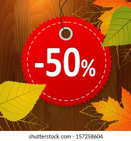 autumn discount sale vector label on wood background. layered. 